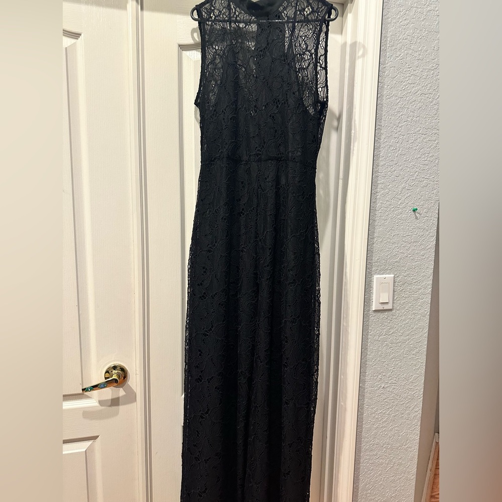 Brand new Zara jumpsuit size xl and is not stretchy. Beautiful lace.